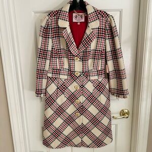 Two piece suit never worn. Been in a dust bag for years.Tweed